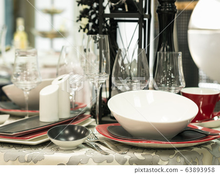 Set of dishes on table Set of dishes on table 63893958