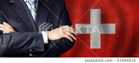 Politician crossed arms of on Swiss flag 63894818