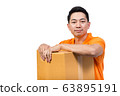 young man holding package box smile face wearing orange uniform polo shirt white background 63895191