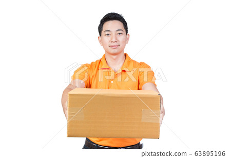 young delivery man holding box cardboard give the young delivery man holding box cardboard give the 63895196