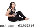 lazy fat woman bored face tired exhausted to exercise hand lift dumbbell weight loss concept 63895216