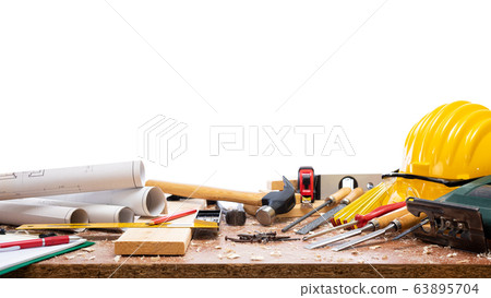 Carpenter tools on the workbench. Carpenter tools on the workbench. 63895704
