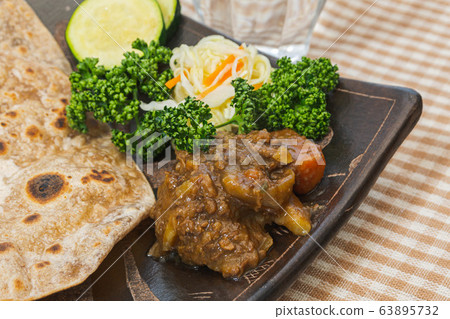 Curry and Chapati Curry and Chapati 63895732