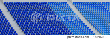 Empty blue and dark-blue seats in the stadium 63896090