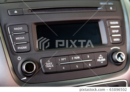 Modern car multimedia control panel close up 63896502