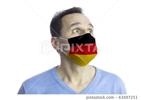Man protective mask. Fear. Isolated. Coronavirus outbreak in Europe. Covid-19 Man protective mask. Fear. Isolated. Coronavirus outbreak in Europe. Covid-19 63897251