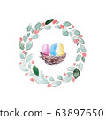 Colorful painted eggs in nest and spring wreath. 63897650