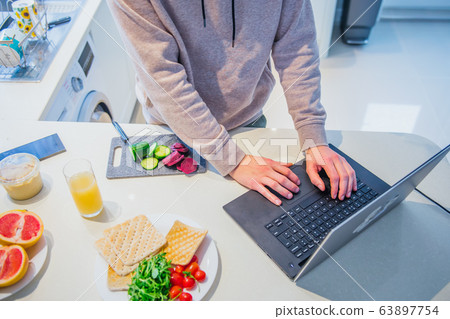 Top view caucasian male hands cooking vegetarian Top view caucasian male hands cooking vegetarian 63897754