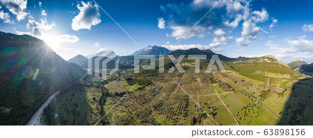Aerial panorama of valley, morning fog over Aerial panorama of valley, morning fog over 63898156