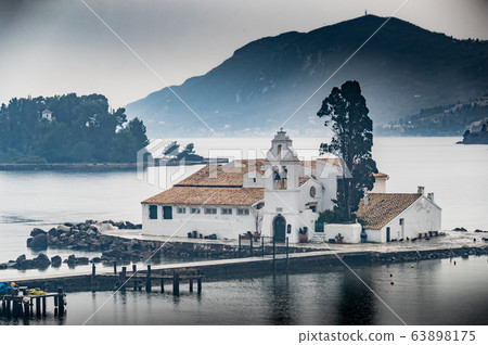Monastery Vlacherna and the Mouse Island at clouds Monastery Vlacherna and the Mouse Island at clouds 63898175