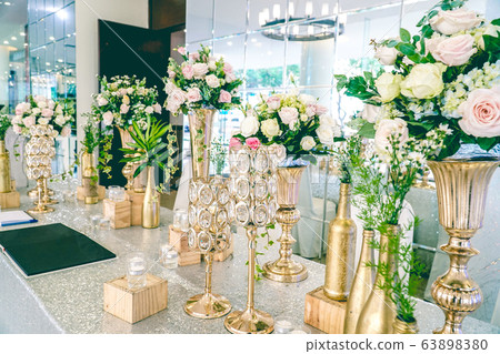 Wedding Welcome table with luxury decoration with rose flower Wedding Welcome table with luxury decoration with rose flower 63898380