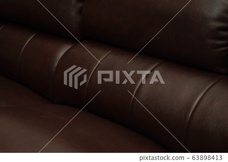Dark Brown leather sofa, close up detail. Furniture showroom photography 63898413