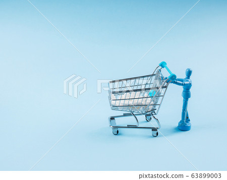Human doll pushing cart with white drugs 63899003