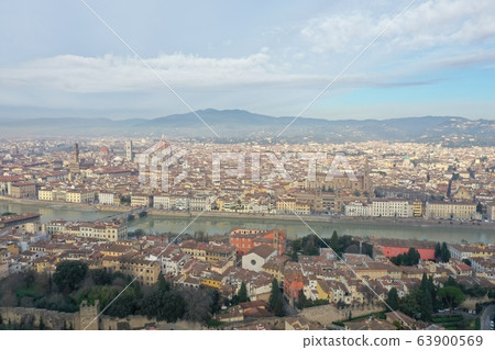 Aerial panorama of Florence at sunrise, Firenze, Tuscany, Italy, cathedral, river, drone pint view, mountains is on background Aerial panorama of Florence at sunrise, Firenze, Tuscany, Italy, cathedral, river, drone pint view, mountains is on background 63900569