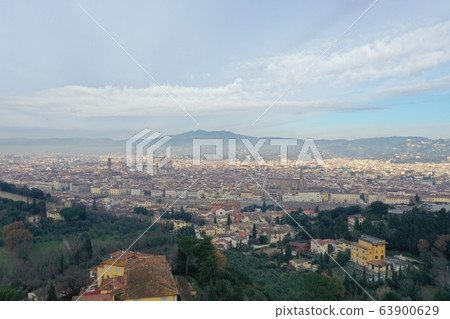Aerial panorama of Florence at sunrise, Firenze, Tuscany, Italy, cathedral, river, drone pint view, mountains is on background Aerial panorama of Florence at sunrise, Firenze, Tuscany, Italy, cathedral, river, drone pint view, mountains is on background 63900629