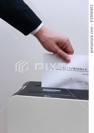 Shredder (office businessman work faceless copy space person electronics suit male) 63906801