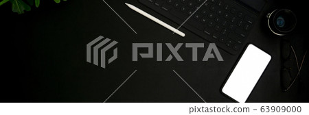 Top view of dark concept workplace with mock-up 63909000