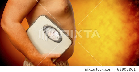 abstract fat middle aged man holds scales in his hand 63909861