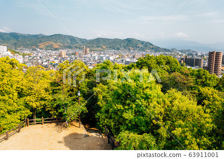 Dogo Park, Ruins of Yuzuki Castle and Matsuyama city panorama view in Matsuyama, Japan 63911001
