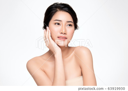 Beautiful Young Asian Woman with Clean Fresh Skin. Face care, Facial treatment, Cosmetology, beauty Beautiful Young Asian Woman with Clean Fresh Skin. Face care, Facial treatment, Cosmetology, beauty 63919930