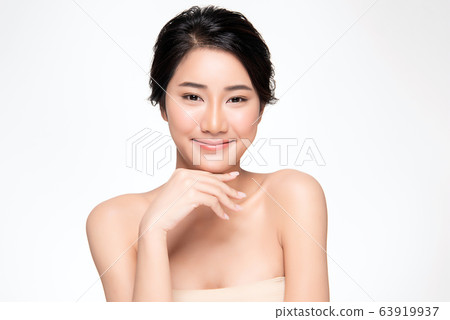 Beautiful Young Asian Woman with Clean Fresh Skin. Face care, Facial treatment, Cosmetology, beauty Beautiful Young Asian Woman with Clean Fresh Skin. Face care, Facial treatment, Cosmetology, beauty 63919937