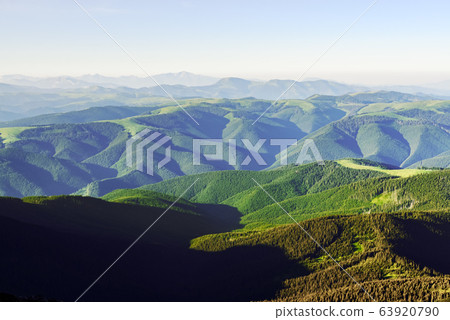 Green mountains range in summer time 63920790