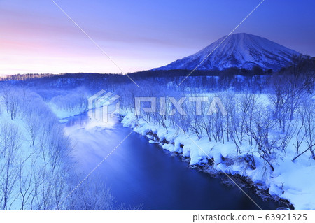 Rime forest and Mt.Yotei and sunrise Rime forest and Mt.Yotei and sunrise 63921325