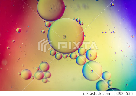 Rainbow abstract defocused background picture made with oil, water and soap Rainbow abstract defocused background picture made with oil, water and soap 63921536