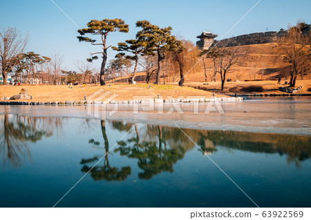 Hwaseong Fortress and frozen pond at winter in Suwon, Korea 63922569