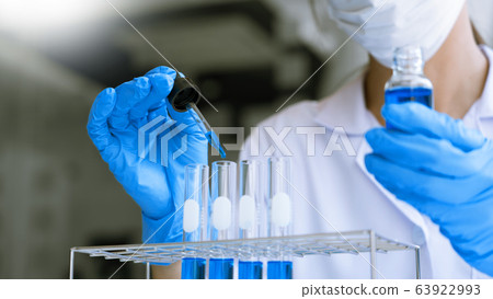 scientists researching in laboratory in white lab 63922993