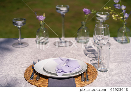 The festive table is served and decorated with The festive table is served and decorated with 63923648