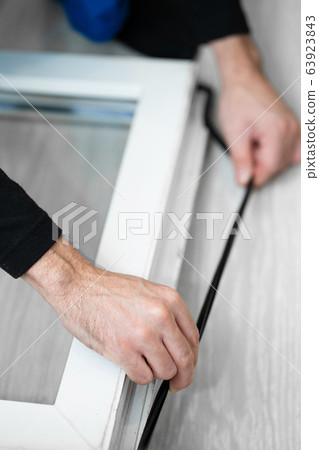 Professional master at repair and installation of 63923843