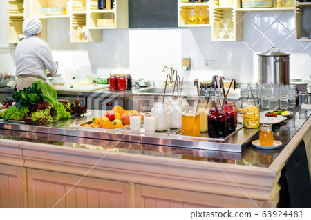 Food at restaurant kitchen. Chef checking meal 63924481