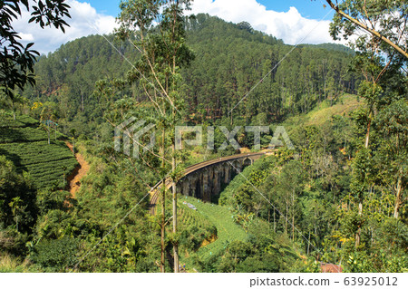 The famous nine-arch bridge of the railway in the The famous nine-arch bridge of the railway in the 63925012