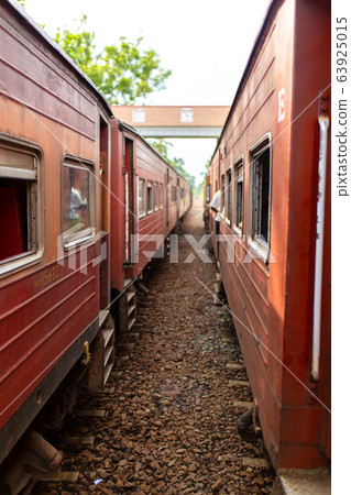 People communicate from the windows of various 63925015