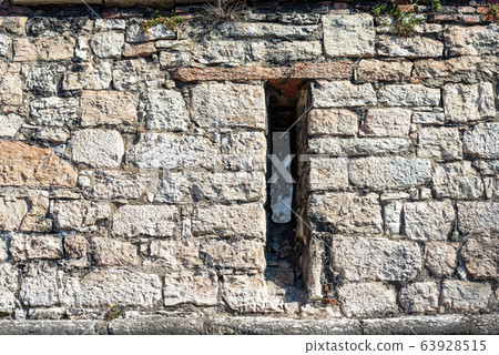 Castle wall with an arrowslit - Castello del Buonconsiglio Trento Italy 63928515