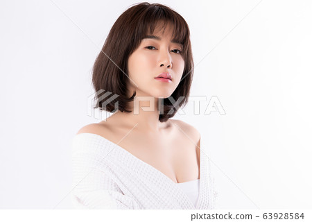 Beautiful Young Asian Woman with Clean Fresh Skin. Face care, Facial treatment, Cosmetology, beauty Beautiful Young Asian Woman with Clean Fresh Skin. Face care, Facial treatment, Cosmetology, beauty 63928584