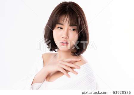 Beautiful Young Asian Woman with Clean Fresh Skin. Face care, Facial treatment, Cosmetology, beauty Beautiful Young Asian Woman with Clean Fresh Skin. Face care, Facial treatment, Cosmetology, beauty 63928586