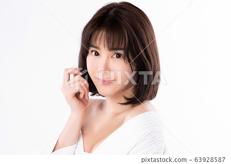 Beautiful Young Asian Woman with Clean Fresh Skin. Face care, Facial treatment, Cosmetology, beauty Beautiful Young Asian Woman with Clean Fresh Skin. Face care, Facial treatment, Cosmetology, beauty 63928587