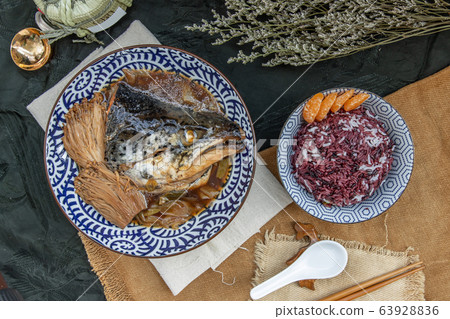 Salmon kabutoni steamed with sweet soya sauce. Salmon kabutoni steamed with sweet soya sauce. 63928836