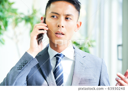 一個年輕的商人 63930248