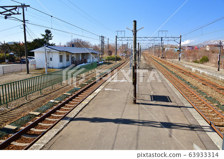 Take a photo of JR Hagino Station in Shiraoi-cho, Hokkaido in early spring 63933314
