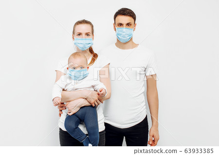 CAVID-19, young family mom dad and small child, 63933385