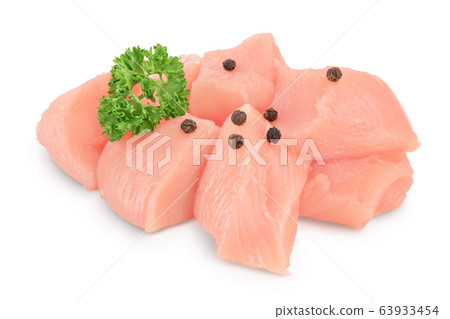 Fresh diced chicken fillet with parsley isolated on white background with clipping path and full depth of field. Fresh diced chicken fillet with parsley isolated on white background with clipping path and full depth of field. 63933454