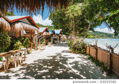 Holiday vacation on beautiful tropical beach, relax chill getaway enjoy summer in El Nido, Palawan island, Philippines Holiday vacation on beautiful tropical beach, relax chill getaway enjoy summer in El Nido, Palawan island, Philippines 63933580