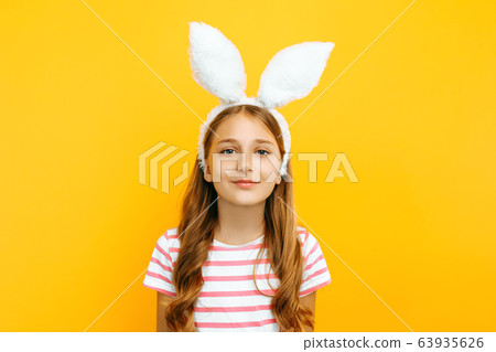 Happy little beautiful girl on her head with Happy little beautiful girl on her head with 63935626