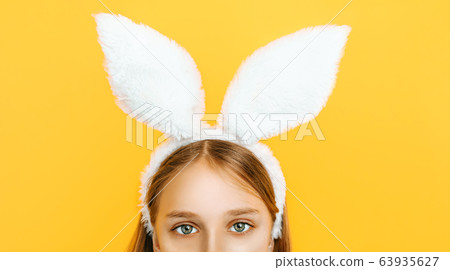 Happy little beautiful girl on her head with Happy little beautiful girl on her head with 63935627