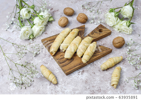 Traditional Azerbaijan holiday Novruz cookies mutaki on white plate on light background 63935891