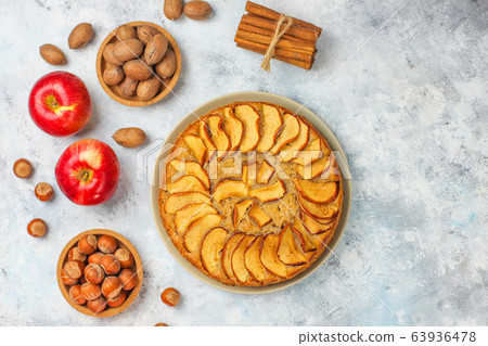 Sweet homemade apple cake with cinnamon 63936478