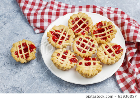 Delicious mini red berry pies,top view 63936857